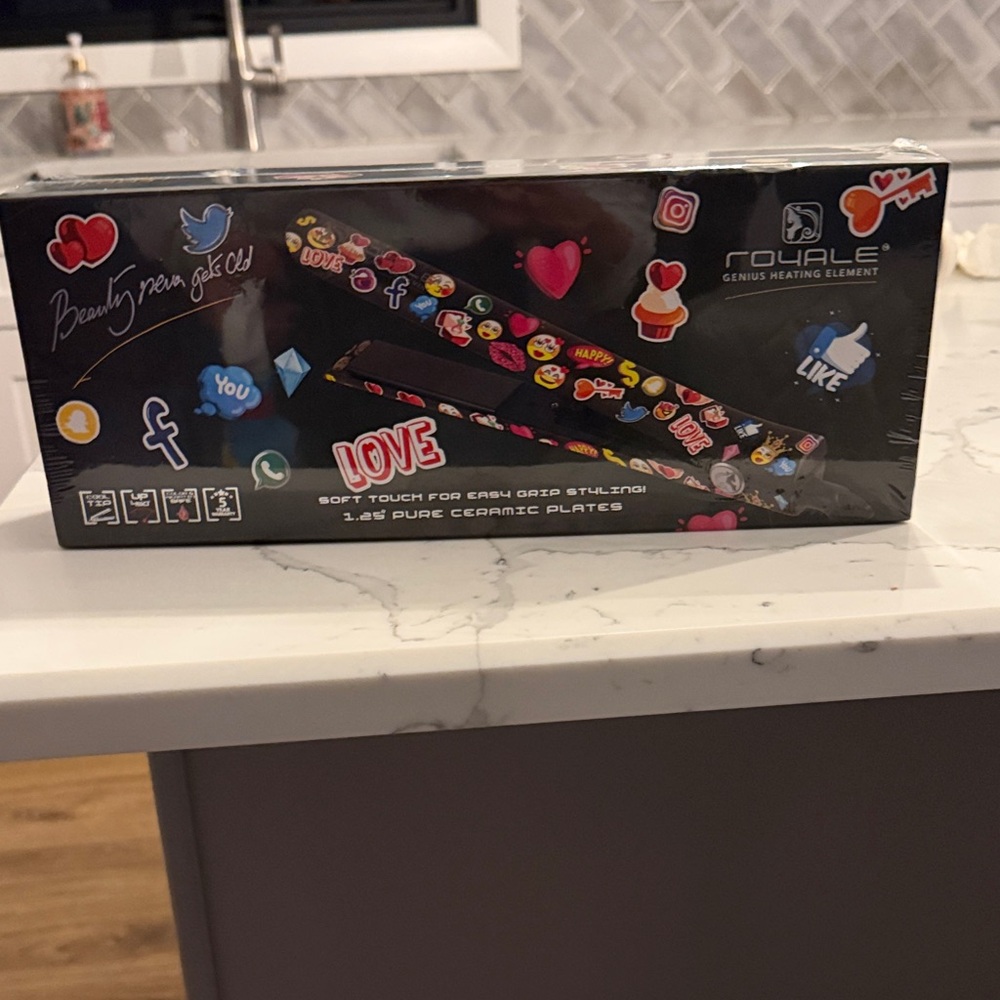 BRAND NEW flat iron 
Rouale Emoji Print Ceramic Flat Iron